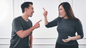 Two employees arguing in a hostile workplace orlando employment law firm